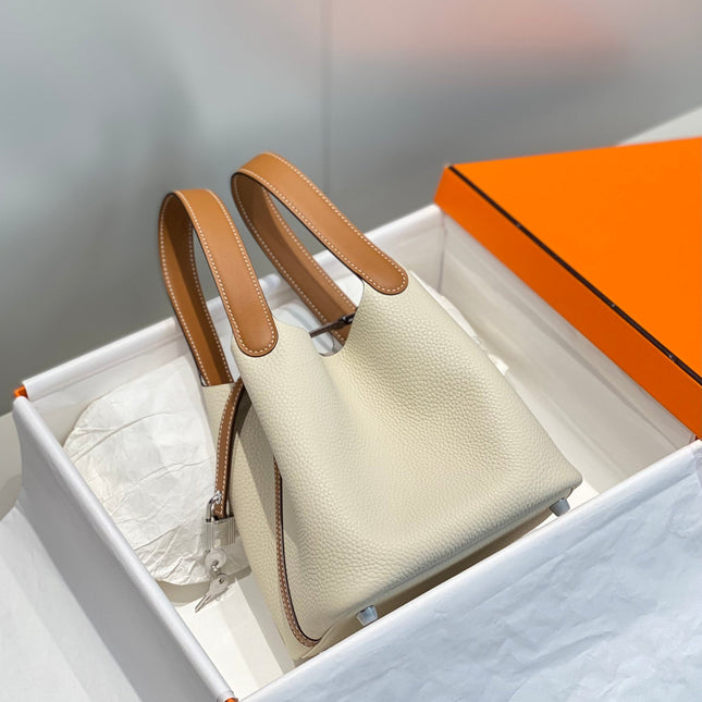 HERMES 25S PICOTIN LOCK 18 IN BURNT ORANGE AND IVORY CALFSKIN SILVER HARDWARE