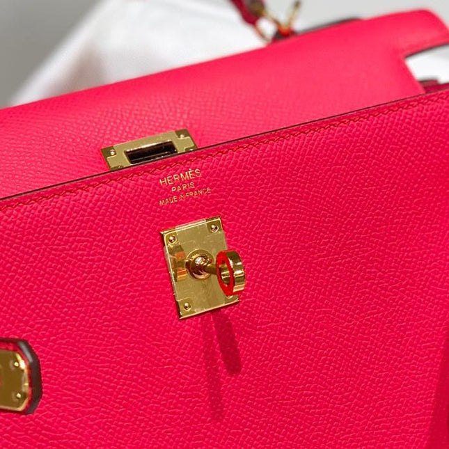 KELLY 25CM IN ROSE TYRIEN SWIFT CALFSKIN GOLD HARDWARE