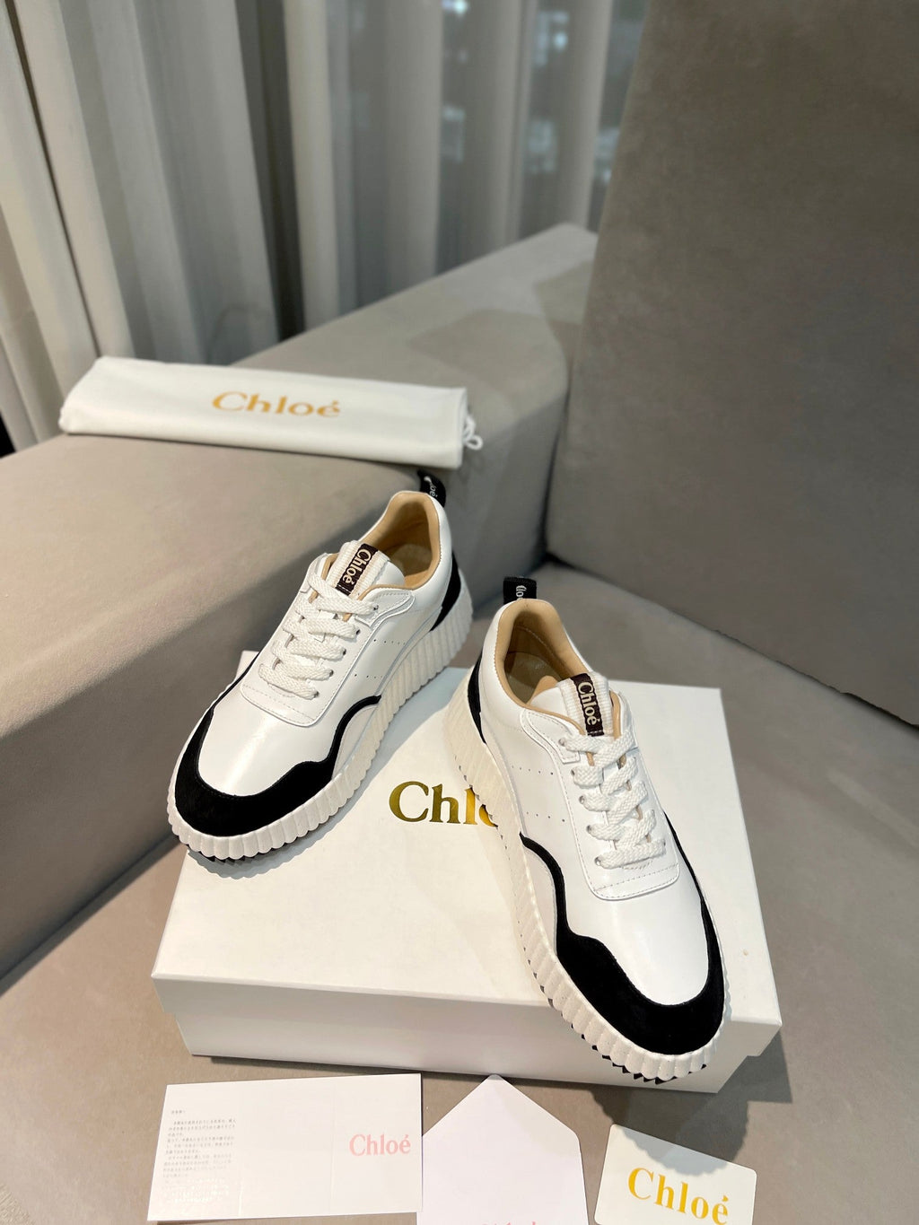 NAMA SNEAKER IN WHITE LAMBSKIN AND BLACK SUEDE