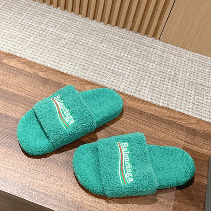 FURRY SLIDES IN TURQUOISE CURLY SHEARLING