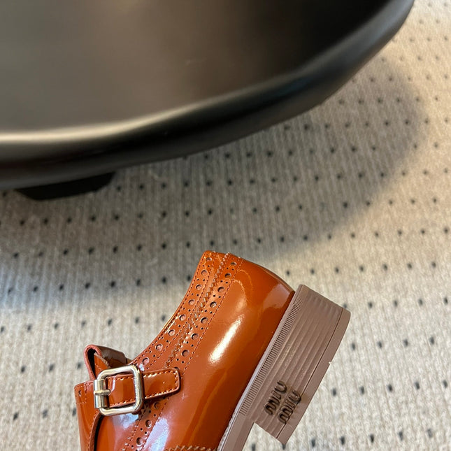 MIUMIU 26S CHURCH BROGUE MONK STRAP SHOES IN RUST ORANGE PATENT CALFSKIN