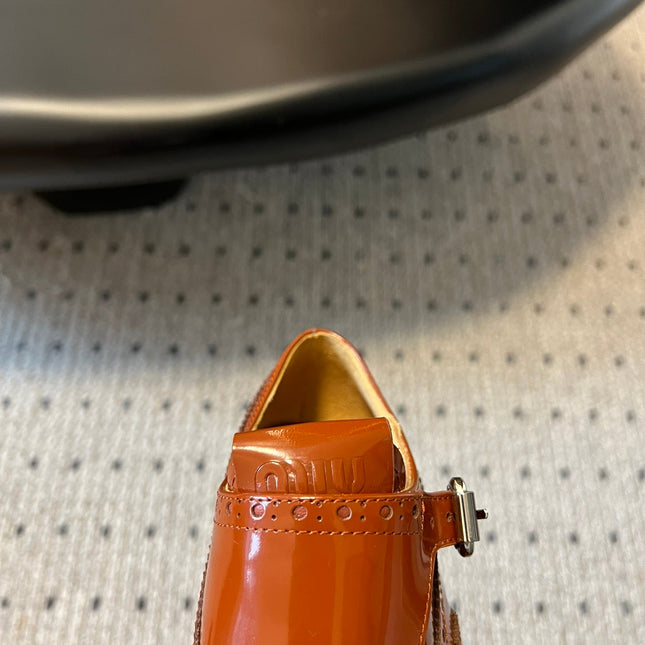MIUMIU 26S CHURCH BROGUE MONK STRAP SHOES IN RUST ORANGE PATENT CALFSKIN