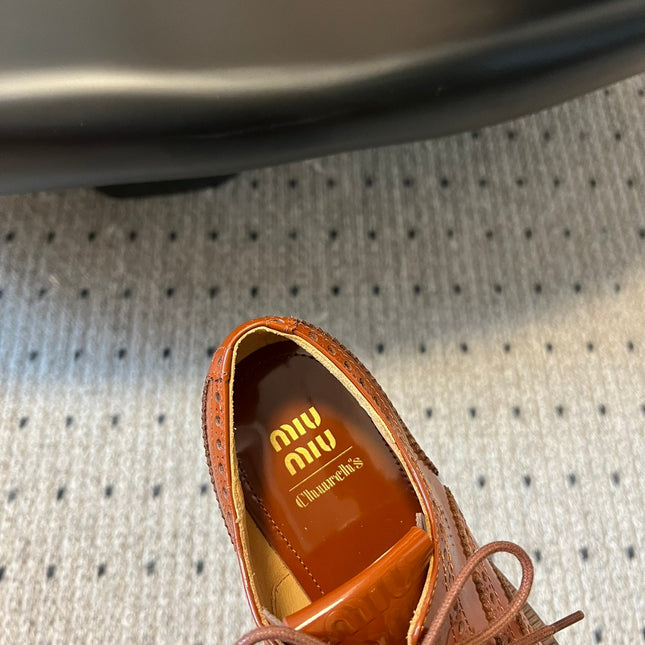 MIUMIU 26S LACE-UP BROGUE LOAFERS IN RUST ORANGE PATENT CALFSKIN