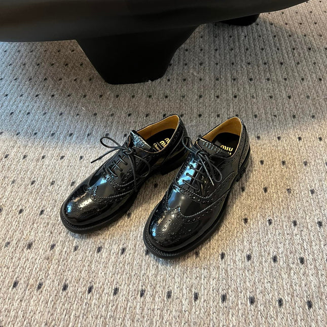 MIUMIU 26S LACE-UP BROGUE LOAFERS IN BLACK PATENT CALFSKIN