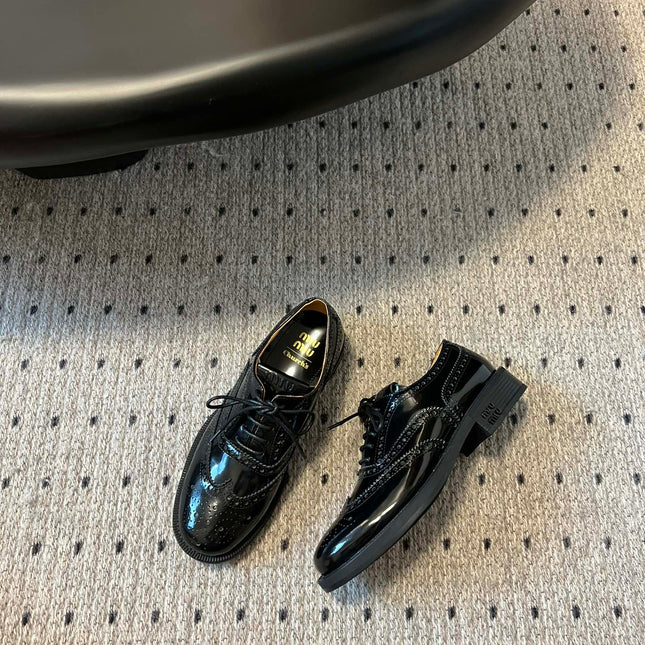 MIUMIU 26S LACE-UP BROGUE LOAFERS IN BLACK PATENT CALFSKIN