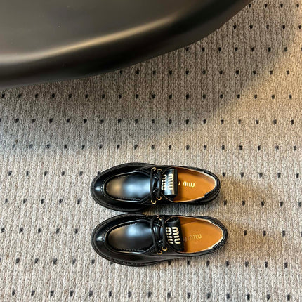 MIUMIU 26S LACED FUME SHOES IN BLACK GLOSSY CALFSKIN