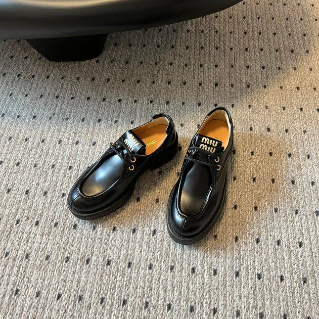 MIUMIU 26S LACED FUME SHOES IN BLACK GLOSSY CALFSKIN