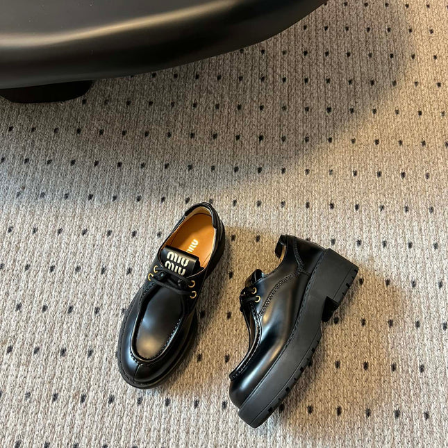 MIUMIU 26S LACED FUME SHOES IN BLACK GLOSSY CALFSKIN