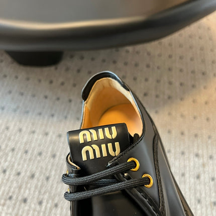 MIUMIU 26S LACED FUME SHOES IN BLACK GLOSSY CALFSKIN
