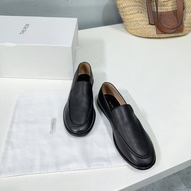 THE ROW 26S CLASSIC LOAFERS IN BLACK CALFSKIN