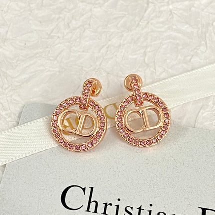 CD 26S CRYSTAL CIRCLE LOGO DROP EARRINGS IN ROSE GOLD TONE METAL 644468