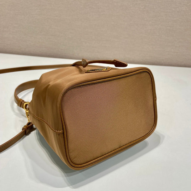 BUCKET BAG 19 IN RUSSET BROWN RE-NYLON AND CALFSKIN HANDLE