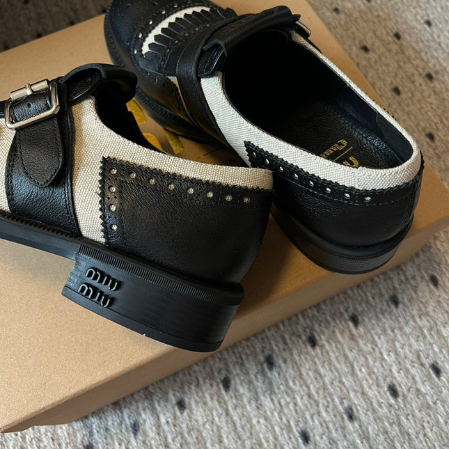 MIUMIU 26S FRINGE BUCKLE LOAFERS IN BLACK CALFSKIN