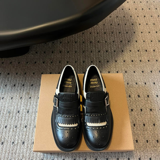 MIUMIU 26S FRINGE BUCKLE LOAFERS IN BLACK CALFSKIN