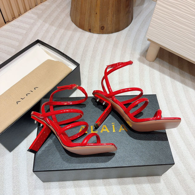ALAIA THREE-STRAPS HIGH HEEL SANDALS IN CHERRY RED PATENT LAMBSKIN