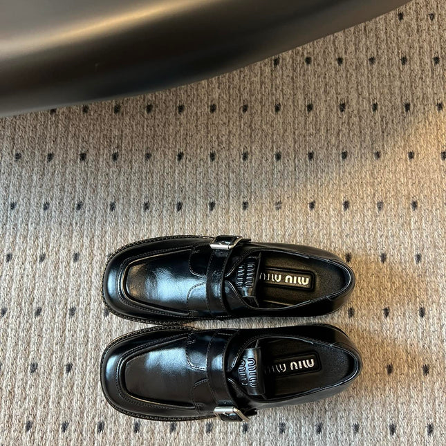 MIUMIU 26S SLIP-ON LOAFERS IN BLACK CALFSKIN SQUARE BUCKLE