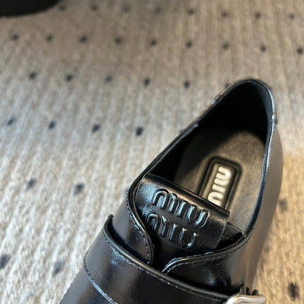 MIUMIU 26S SLIP-ON LOAFERS IN BLACK CALFSKIN SQUARE BUCKLE