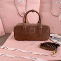 ARCADIE BAG 27 IN PENNY BROWN SUEDE GOLD HARDWARE