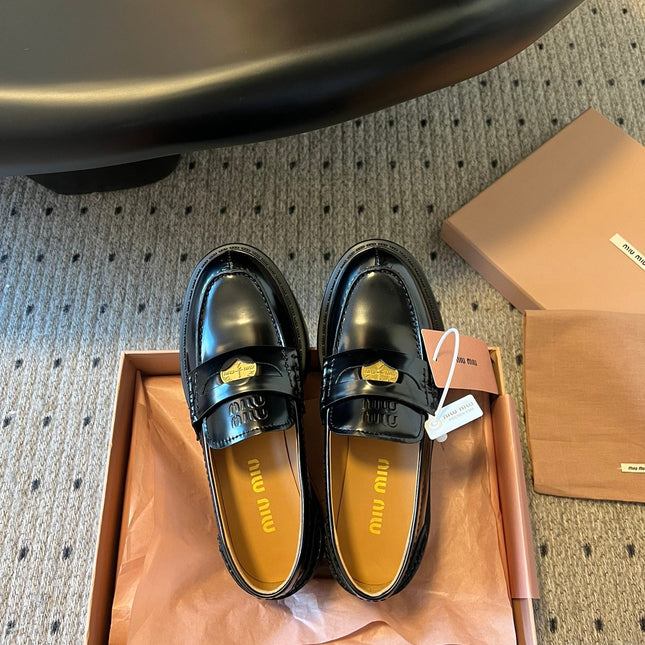 MIUMIU 26S PENNY LOAFERS IN BLACK SHINY CALFSKIN