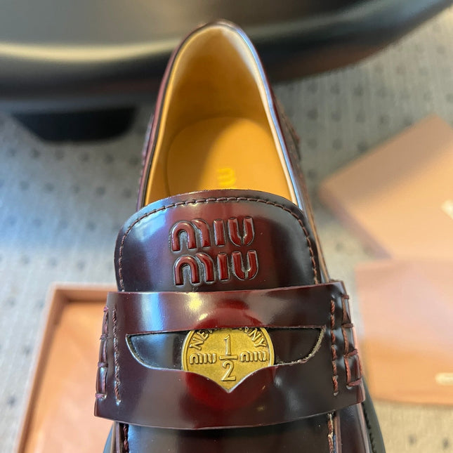 MIUMIU 26S PENNY LOAFERS IN BURGUNDY BROWN SHINY CALFSKIN