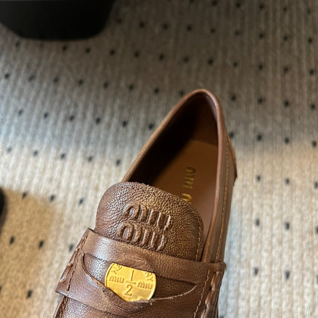 MIUMIU 26S PENNY LOAFERS IN BROWN CALFSKIN GOLD HARDWARE