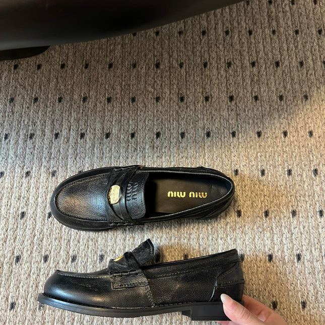 MIUMIU 26S PENNY LOAFERS IN BLACK CALFSKIN GOLD HARDWARE