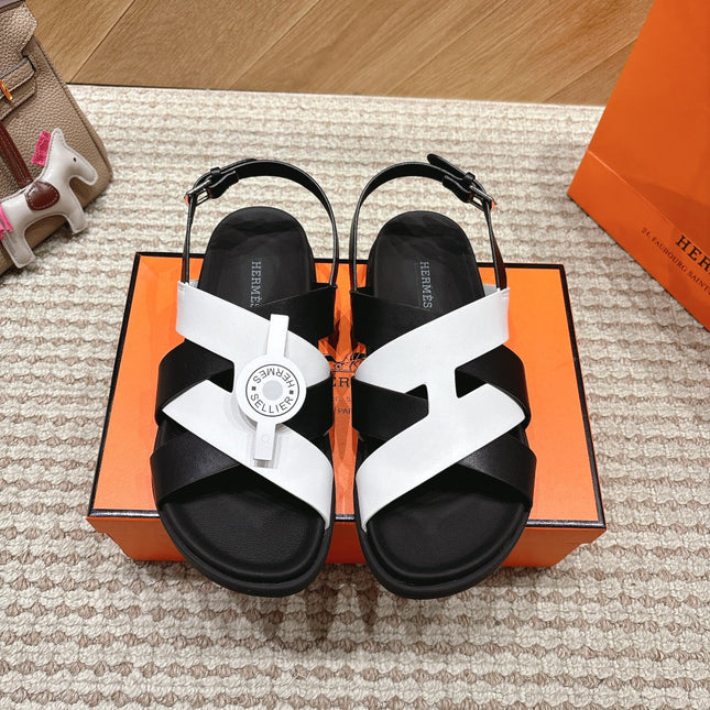 HM 26S CROSS-STRAP SANDALS IN BLACK AND WHITE CALFSKIN