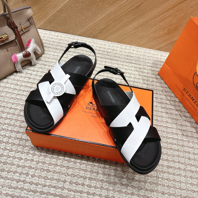 HM 26S CROSS-STRAP SANDALS IN BLACK AND WHITE CALFSKIN