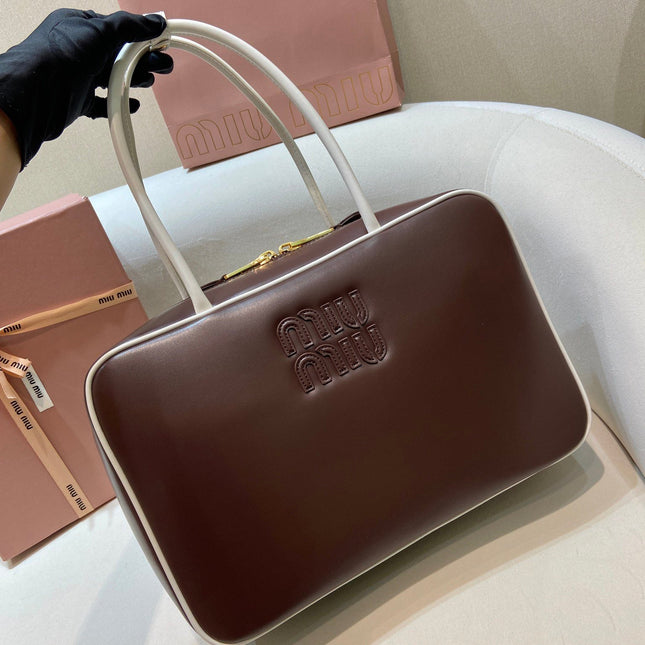 MIUMIU 26S BEAU BAG 34 IN DARK BROWN AND WHITE CALFSKIN