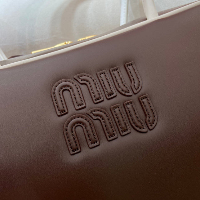 MIUMIU 26S BEAU BAG 34 IN DARK BROWN AND WHITE CALFSKIN
