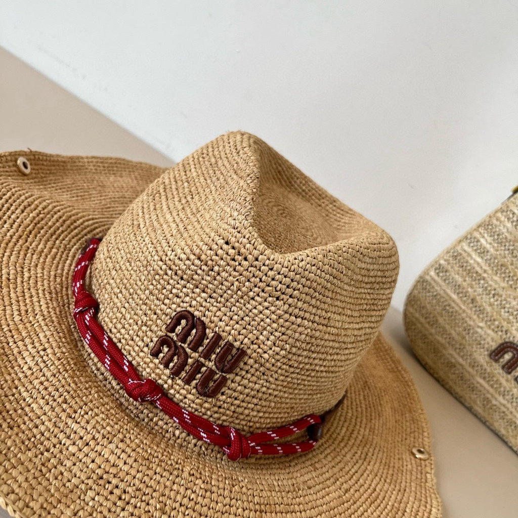 RAFFIA STRAW HAT WITH A RED WOVEN BAND