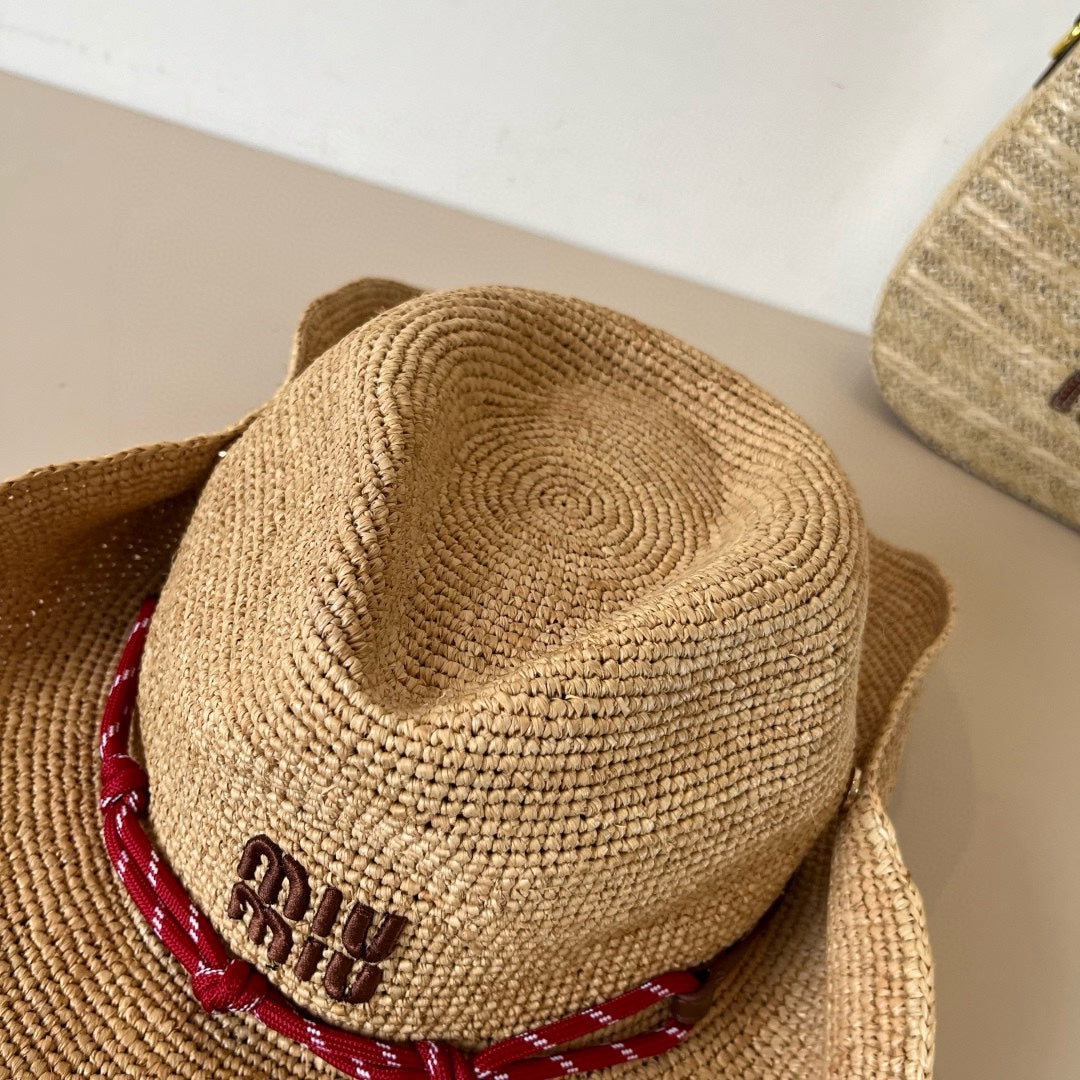 RAFFIA STRAW HAT WITH A RED WOVEN BAND