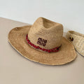 RAFFIA STRAW HAT WITH A RED WOVEN BAND