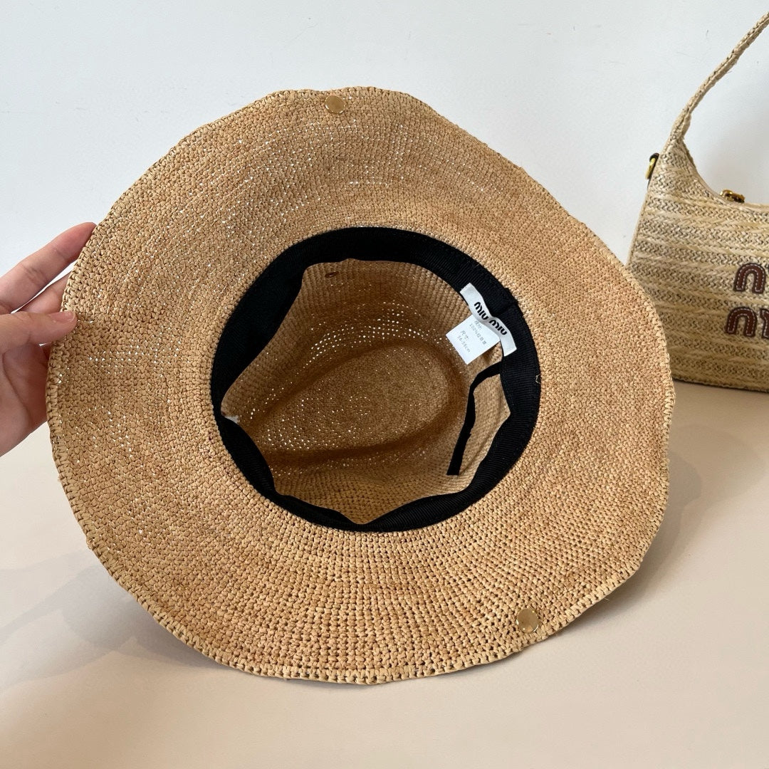 RAFFIA STRAW HAT WITH A RED WOVEN BAND