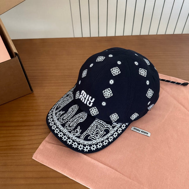 MIUMIU BASEBALL CAP IN BLACK WITH WHITE EMBROIDERED PATTERN