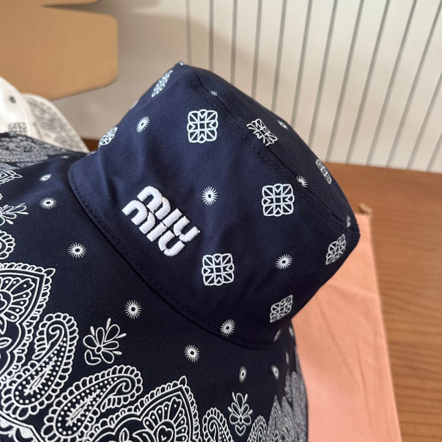 MIUMIU BUCKET IN BLACK FABRIC WITH EMBROIDERED PATTERN