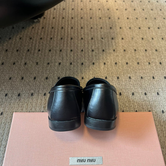 MIUMIU 26S LOAFERS IN BLACK CALFSKIN