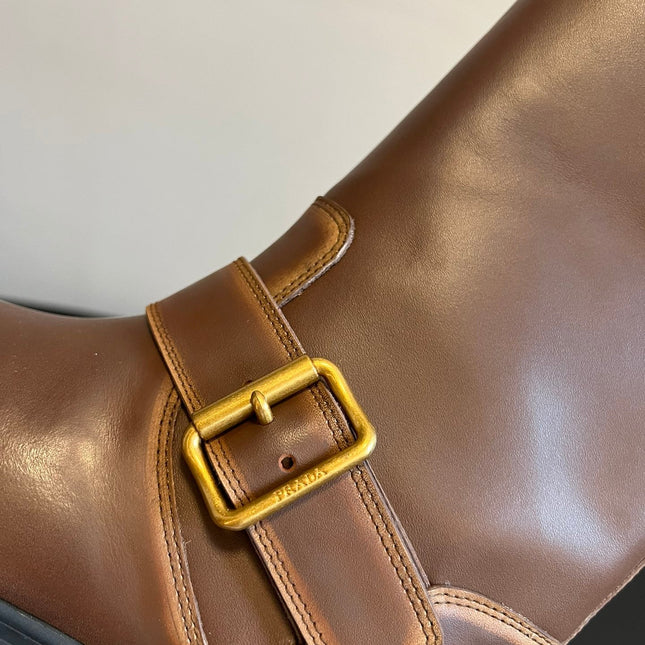PRADA 25S HIGH-CUT PLATFORM BOOTS IN BROWN CALFSKIN WITH GOLD HARDWARE