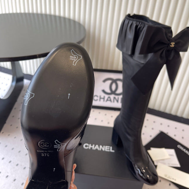 CHANEL BOW HIGH BOOTS IN BLACK CALFSKIN