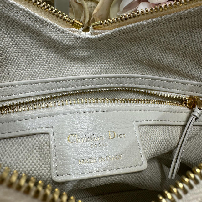 DIOR 26S VOYAGE BAG 28 IN CREAM WHITE CALFSKIN