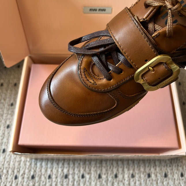 MIUMIU 26S GYMNASIUM SNEAKER IN COGNAC BROWN CALFSKIN WITH GOLD BUCKLED STRAP
