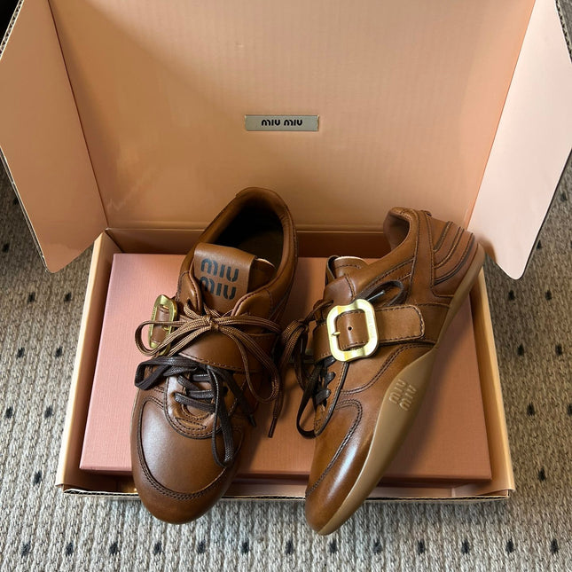 MIUMIU 26S GYMNASIUM SNEAKER IN COGNAC BROWN CALFSKIN WITH GOLD BUCKLED STRAP