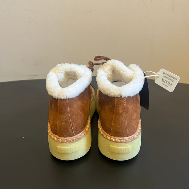 PRADA 25S HIGH-TOP SHOES 40 MM IN BROWN SUEDE SHEARLING-LINED