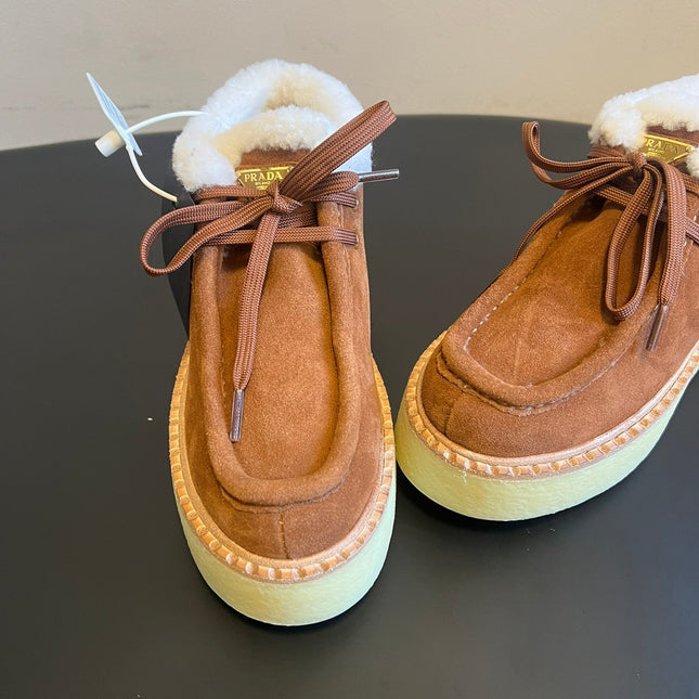 PRADA 25S HIGH-TOP SHOES 40 MM IN BROWN SUEDE SHEARLING-LINED