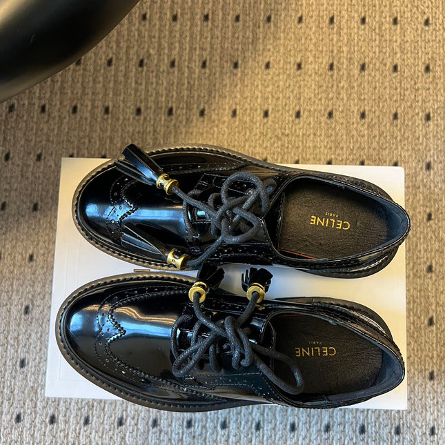 CELINE 26S SAINTNJORD TASSEL LOAFER 50 MM IN BLACK CALFSKIN