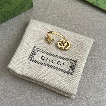 GUCCI 26S GG STAR OPEN RING WITH CRYSTALS IN GOLD TONE METAL 614453