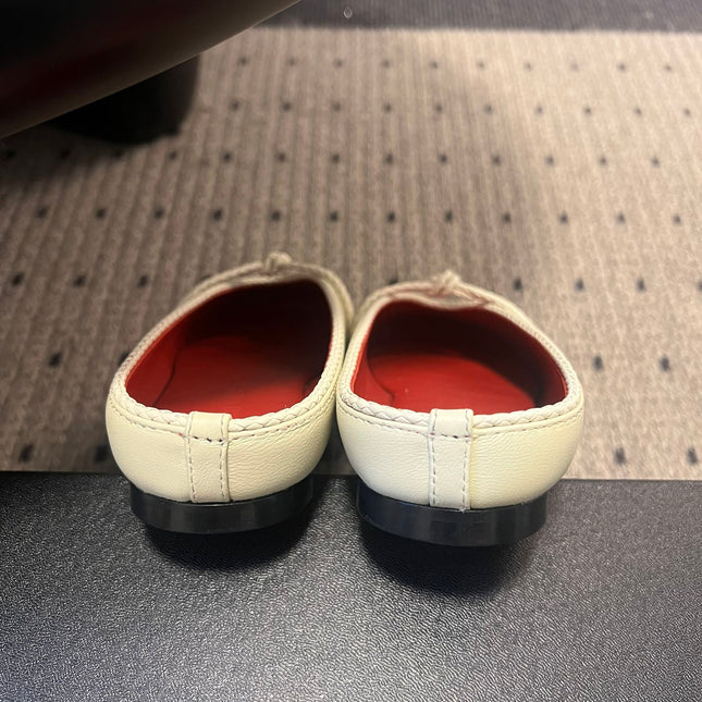 BOTTEGA VENETA 26S FLAT MULES IN CREAM WHITE LAMBSKIN