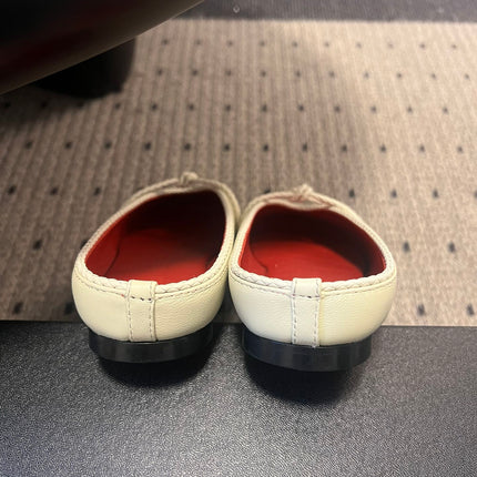 BOTTEGA VENETA 26S FLAT MULES IN CREAM WHITE LAMBSKIN