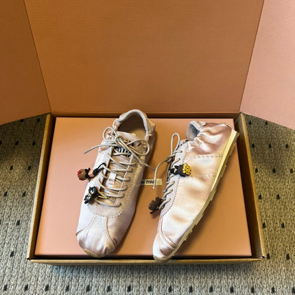 MIUMIU 26S SNEAKERS IN LIGHT PINK PLUME SATIN