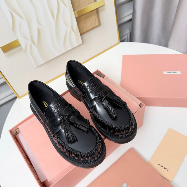 MIUMIU 26S TASSEL LOAFERS IN BLACK CALFSKIN